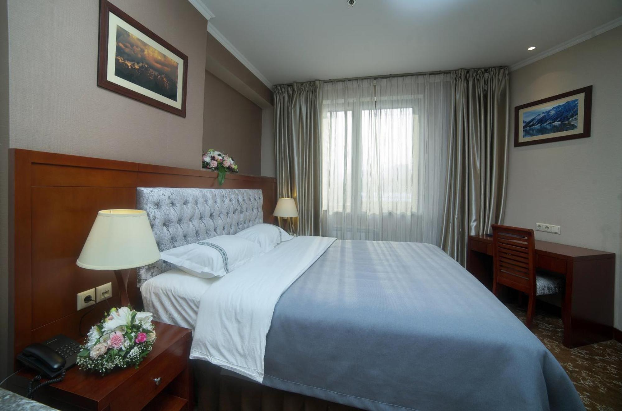 Grand Voyage Hotel Almaty Zimmer foto